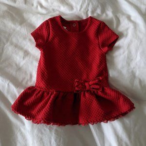 Red peplum top with bow